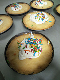 Butterscrotch Cookie with cream and rainbow sprinkles as toppings